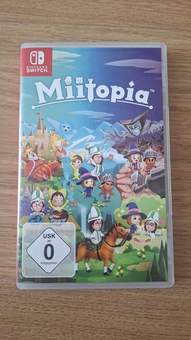 Nintendo Switch OLED White + игра Miitopia