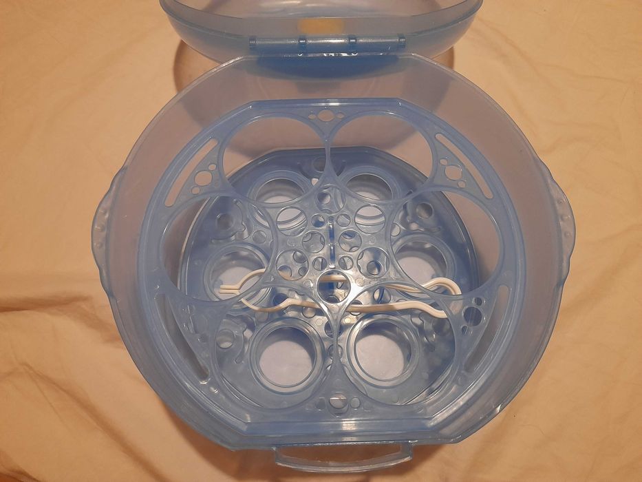 Двуфазна помпа за кърма Medela и подарък стерилизатор за микровълнова