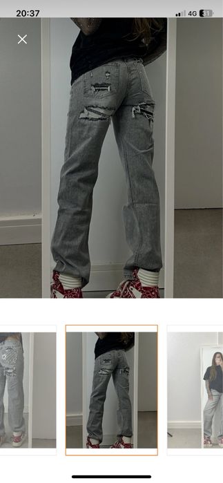 Blugi gri cu model pe spate