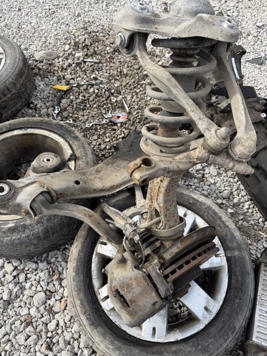 Лагер главини комплект с макферсони,носачи дискове апарати VW Passat 5