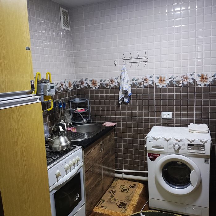 2-комнатная квартира на 1-м этаже в г. Ангрен