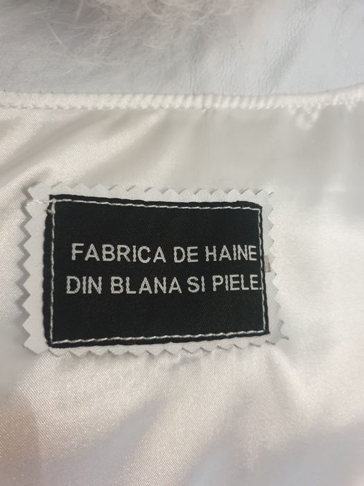 Haină din blană de vulpe polară