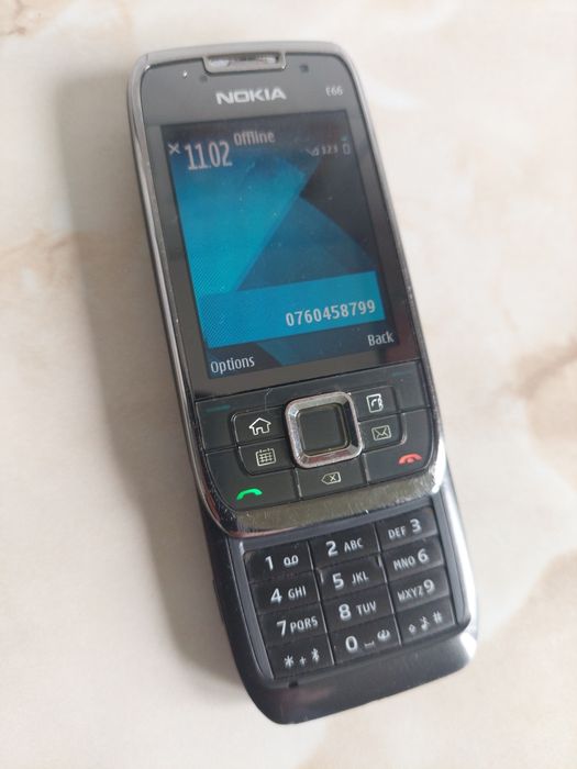 [E66] Vând Nokia E66 Grey Steel, fără probleme și NEcodat //poze reale