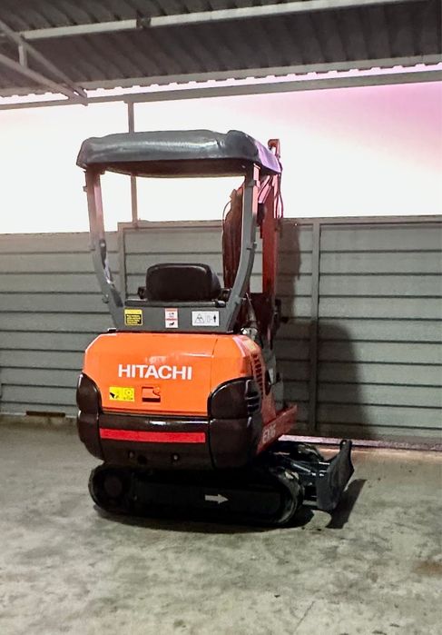 Miniexcavator hitachi/motor kubota in trei pistoane
