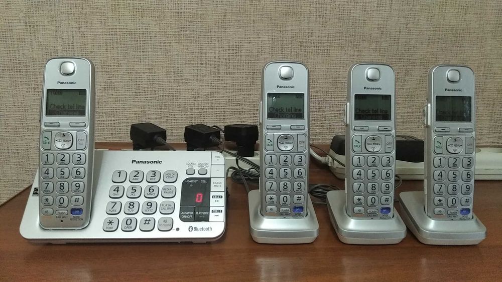 Продам радиотелефон PANASONIС четыре трубки на один телефонный номер.