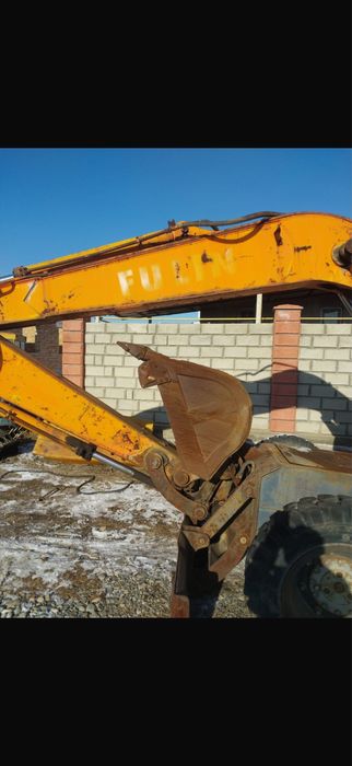 Экскаватор колесный