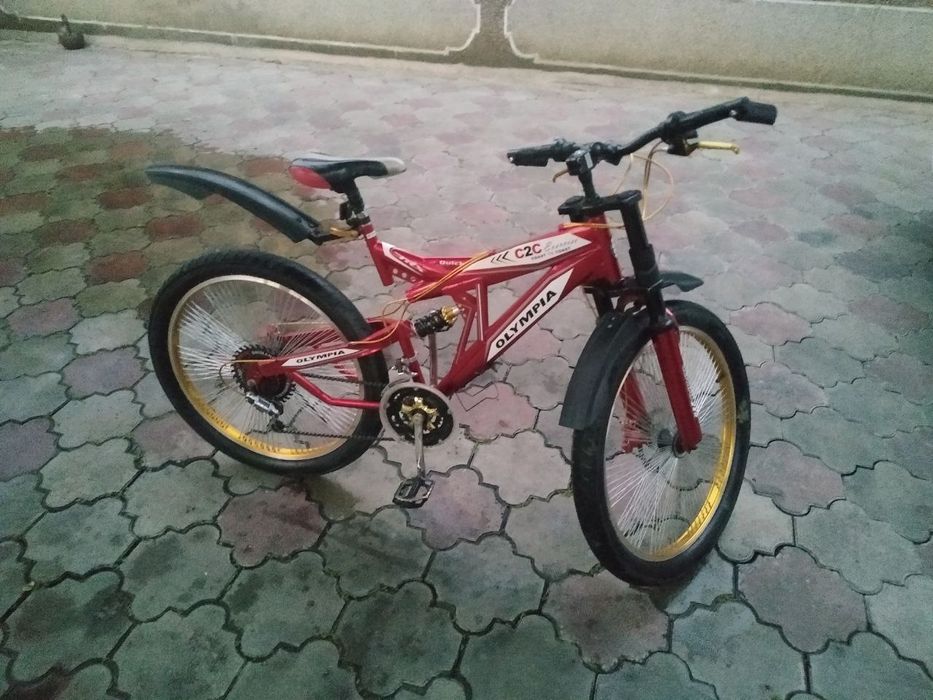 Велосипед красный новая