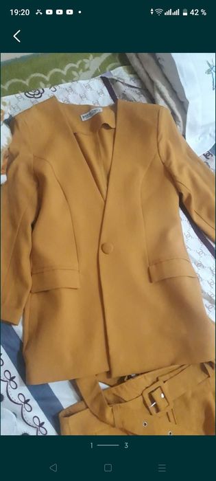 Продам брючный костюм комплект