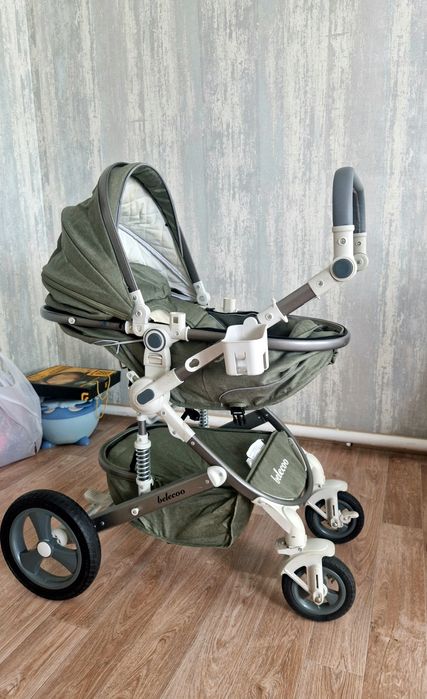 Продам коляску и детский стульчик