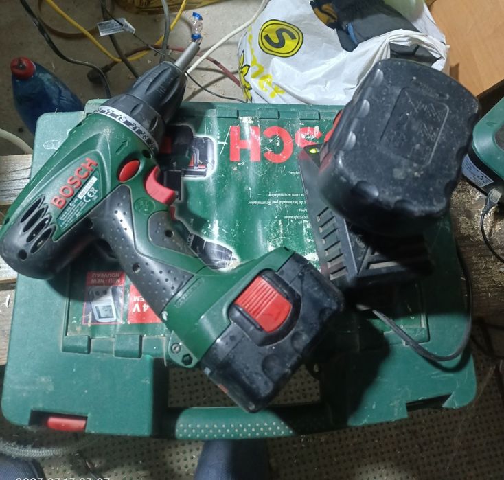 Bormasina /filetanta Bosch PSR 14,4-2 cu 2 acumulatori  morți