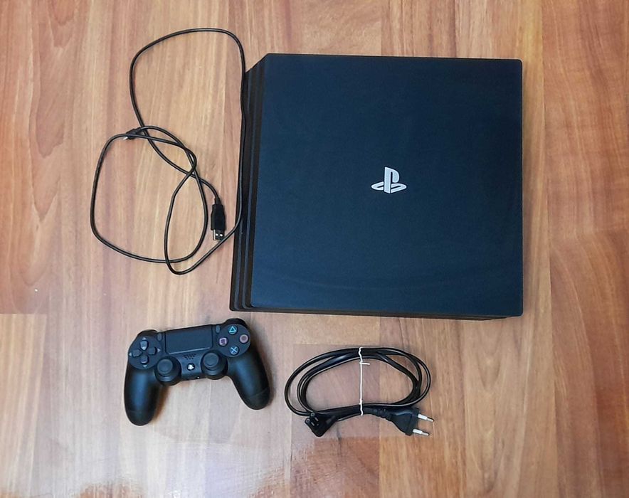 PS4 Pro 1TB, putin folosit + controller + cabluri