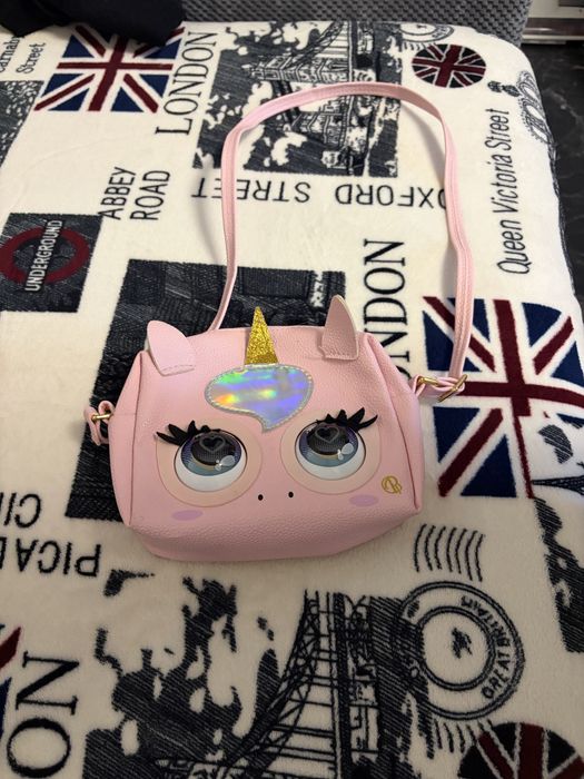 Purse gentuta interactiva pets