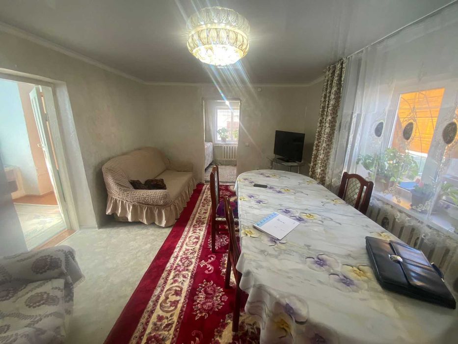 Дом на Бугре, Танат Империя