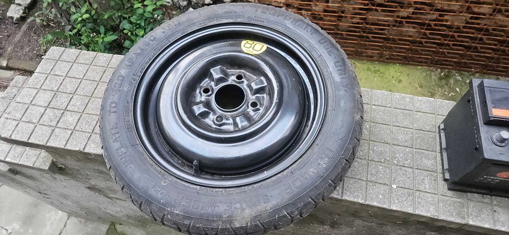 Резервна гума тип "патерица" от Нисан Примера Р11.