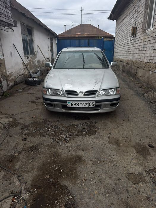 Ниссан примера п11