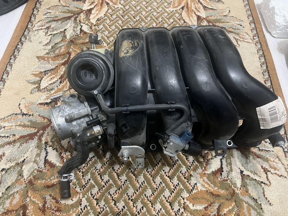 Продам впускной коллектор Toyota Corolla 1,8