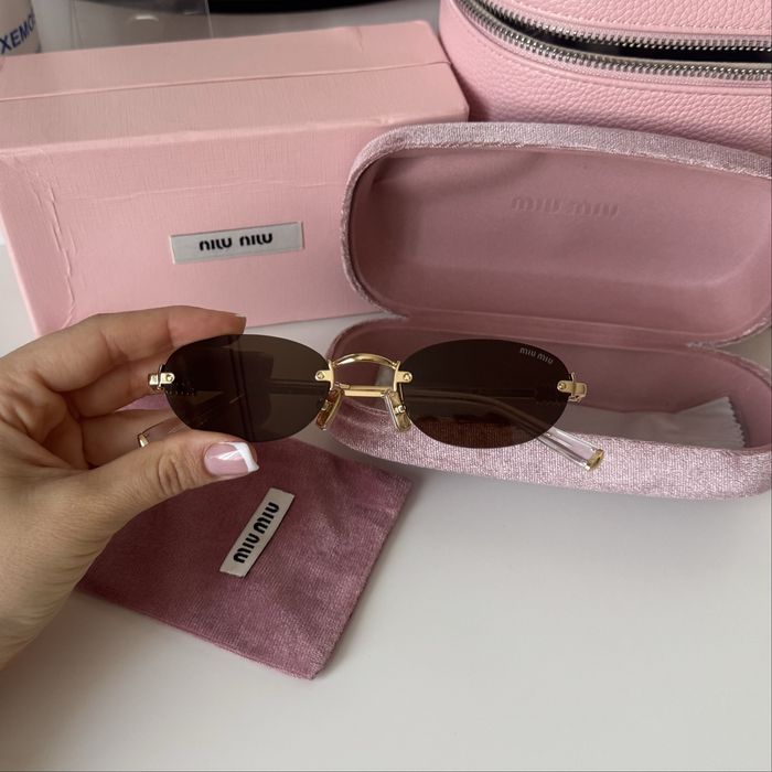 Овални очила MiuMiu