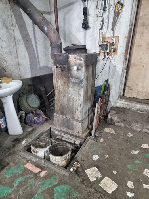 Печь-котел длительного горения.