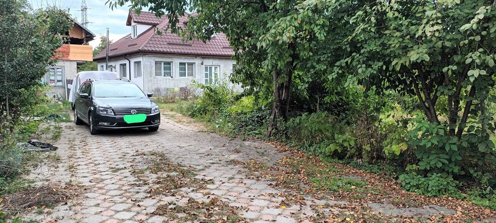 vand casa P+M cu teren de 2000 mp
