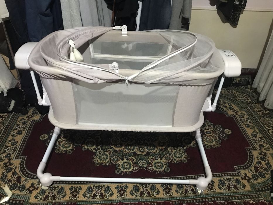 Iyulka, elektronning beshik,bolalar manej krovat.