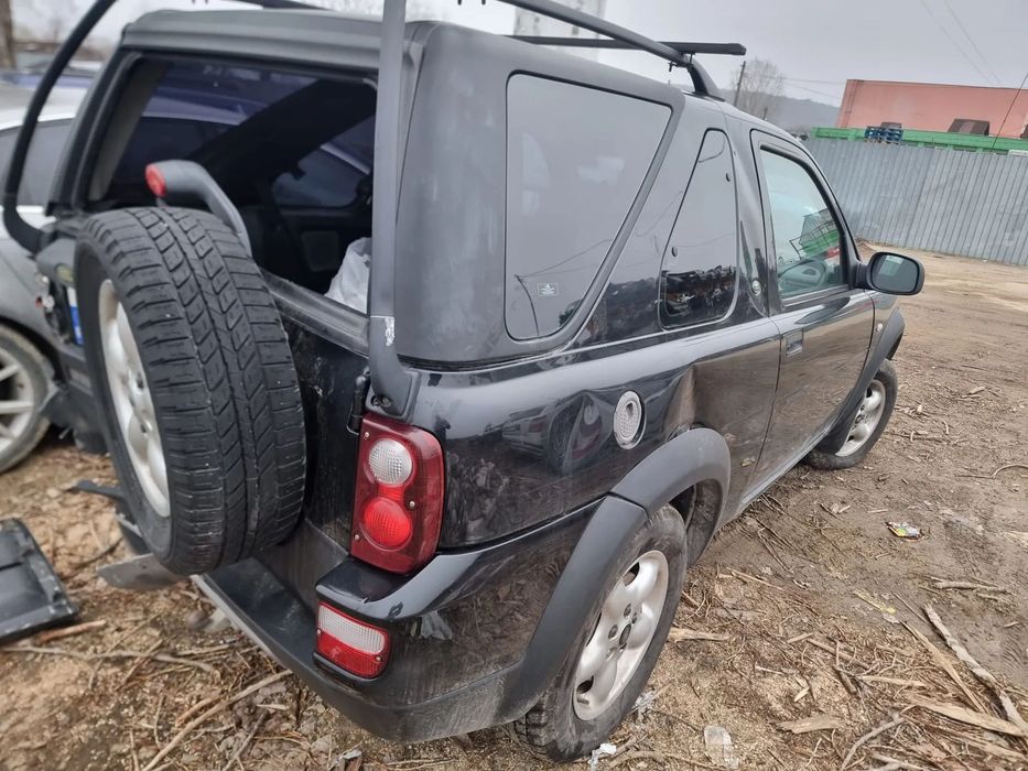 jante aliaj bara fata capota grila armatura trager radiator apa clima intercooler far oglinda usa stanga dreapta fata plansa ceasuri bord spira volan scaun stanga dreapta Land Rover Freelander 1 facelift, 2005, motor 2.0 td4 204D3, cutie de viteze manuala