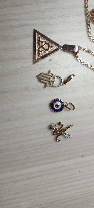 Золотой кулон 585 пр тумар