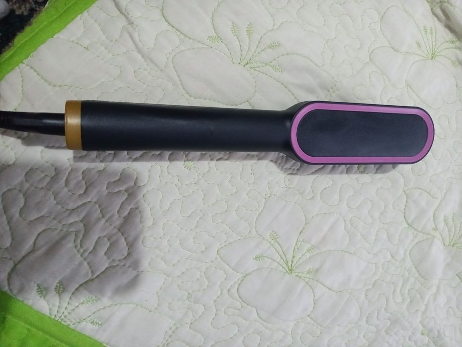 Perie de îndreptat părul