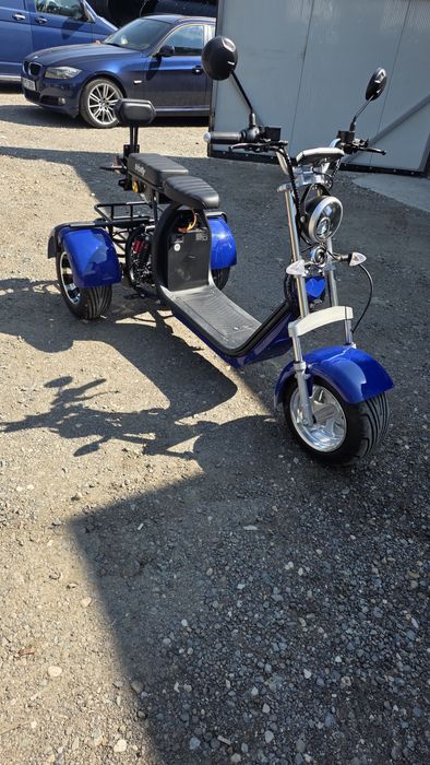 Scuter electric cu 3 roti