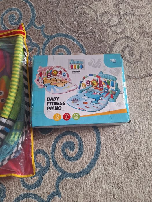 Ходунок и игровой коврик