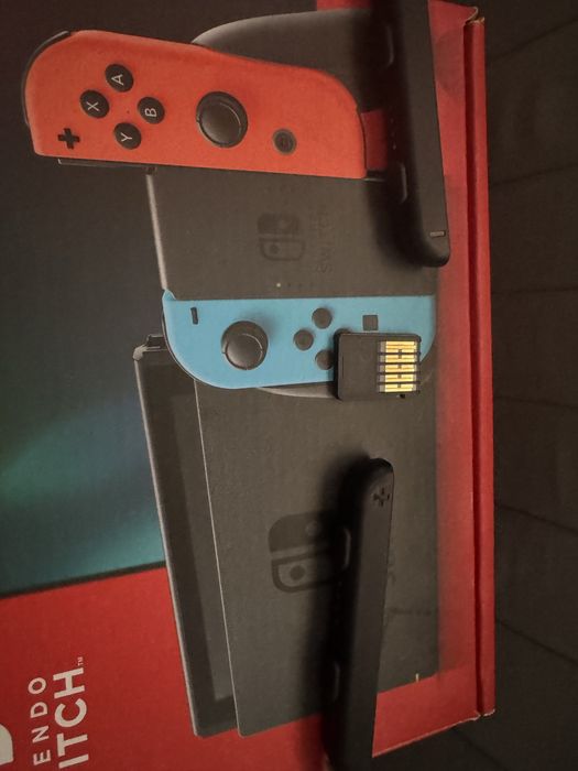 Nintendo Switch ( utilizat de maxim zece ori)