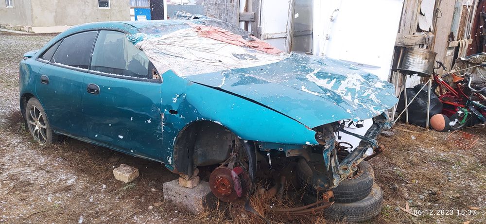 Мазда Mazda 323 95