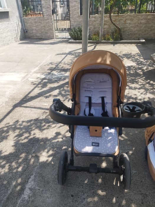 Бебешка кожена количка