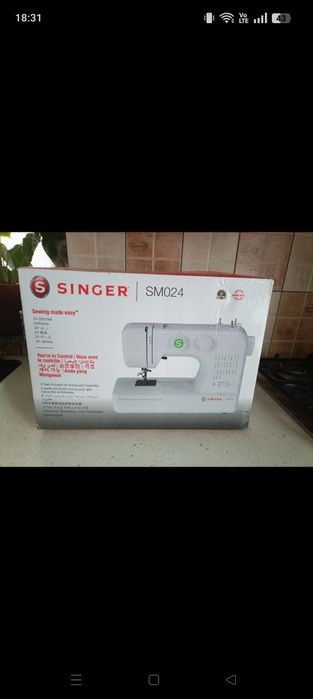 Mașina de cusut Singer