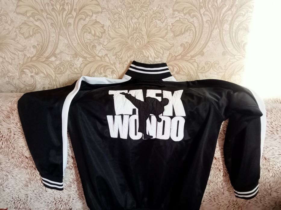 Таэквондо одежда 12 лет,мальчику срочно!!!