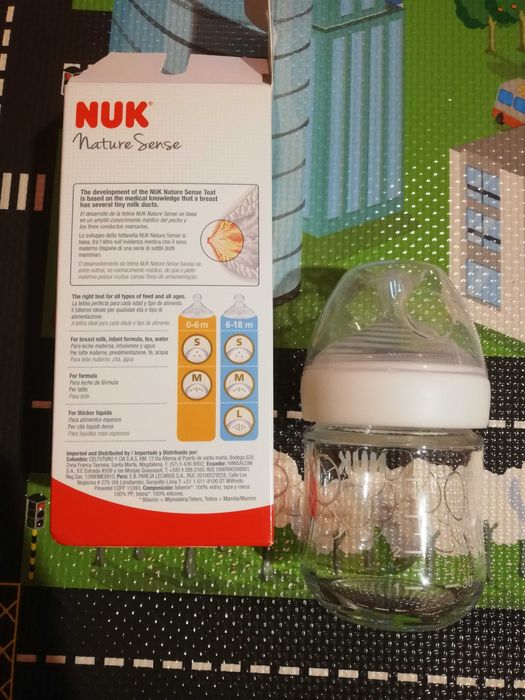 Стъклено шише Nuk Nature sense- 120 мл + нови биберони S