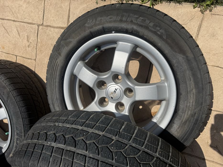 Jante aliaj Rial R15 cu anvelope de iarnă 195/65 R15 – set 4 buc.