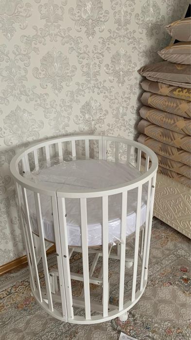 Круглая детская кроватка-трансформер 9/1