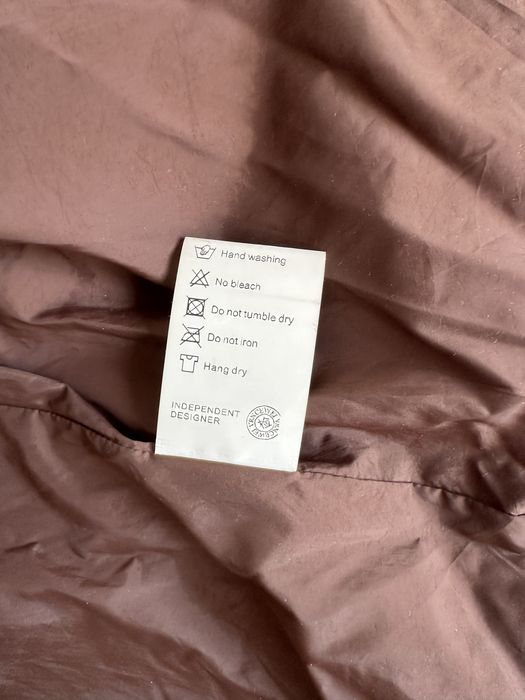 Женский пуховик длинный