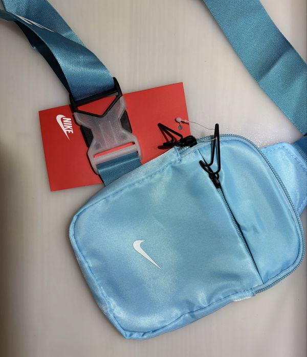 Borsetă Nike culoare albastru deschis