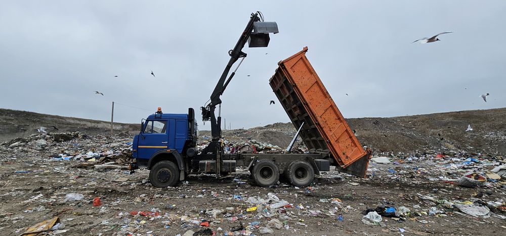 Вывоз мусора грейфер