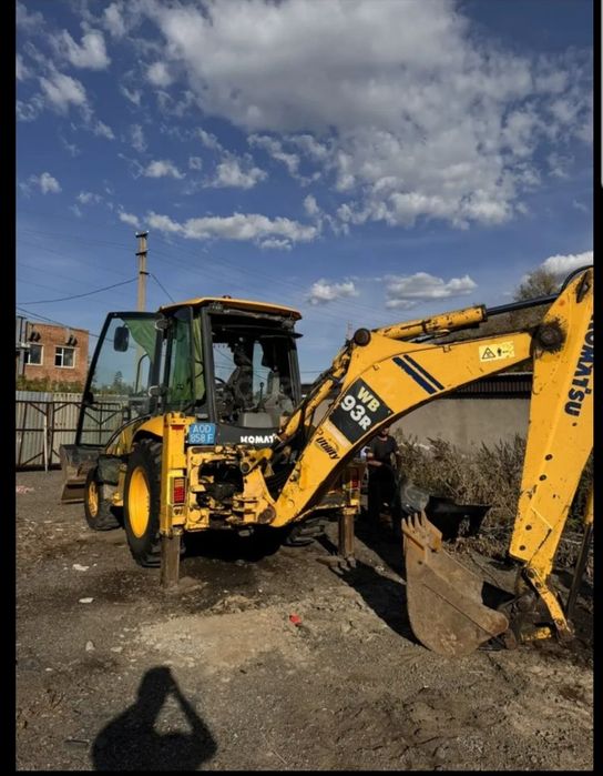 Услуги экскаватора-погрузчика