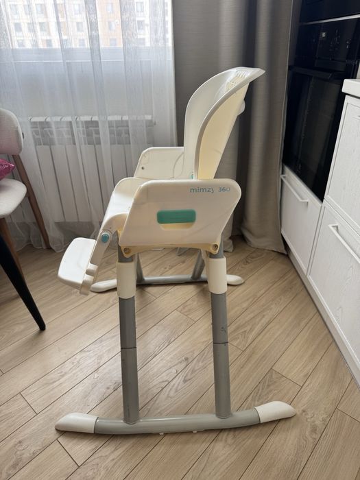 Продам стульчик для комления Joie mimzy 360