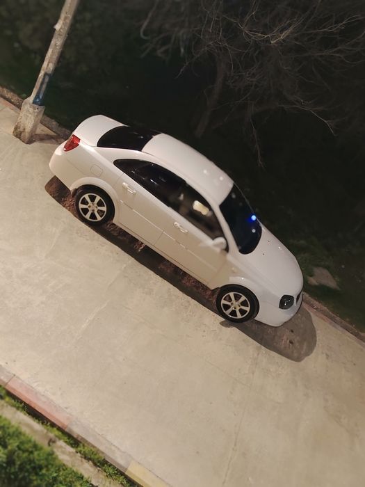 Шевроле ласетти 1.8