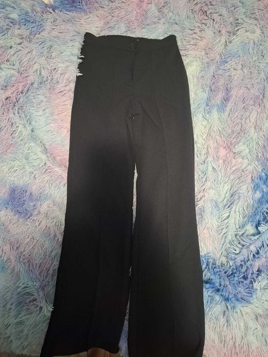 Pantaloni eleganți noi