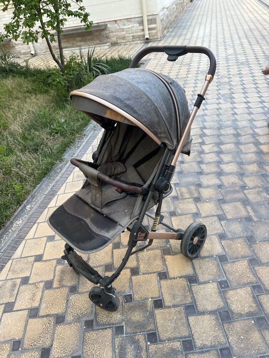Детская прогулочная коляска
