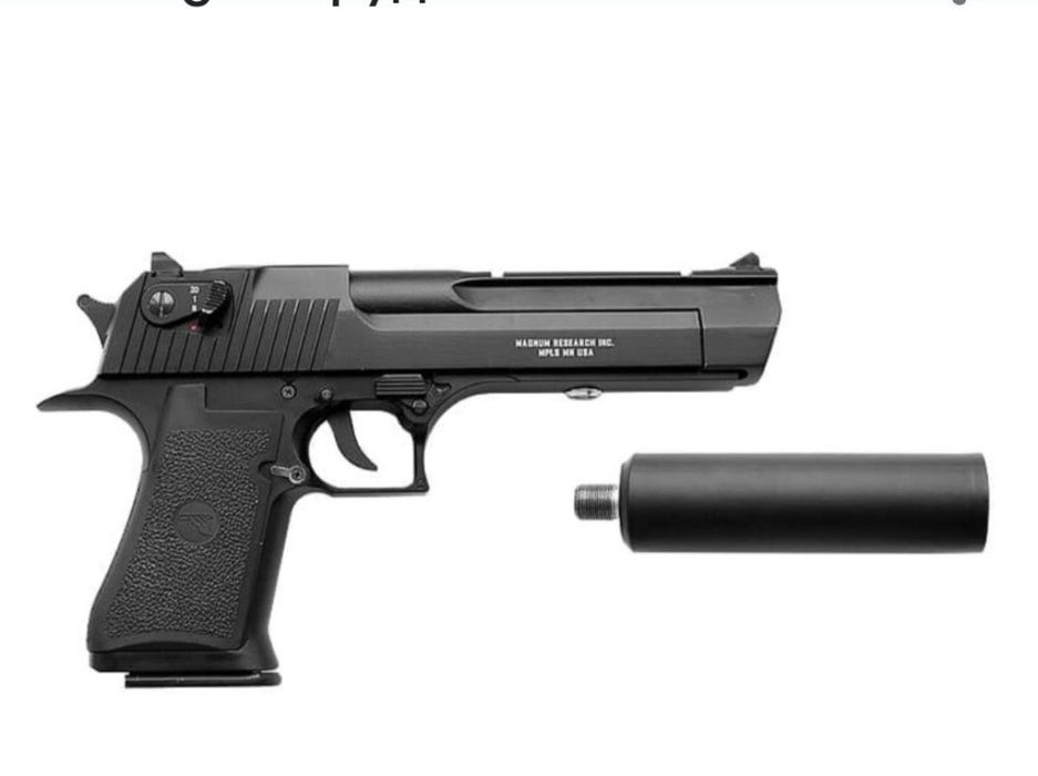 Игрушечный металлический пистолет