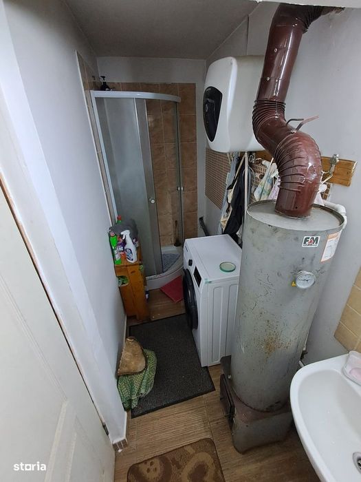 Casa cu 2 camere, teren 1000 mp, acces asfaltat