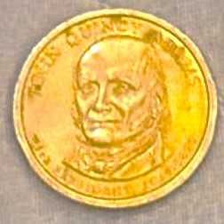 Монета в один доллар