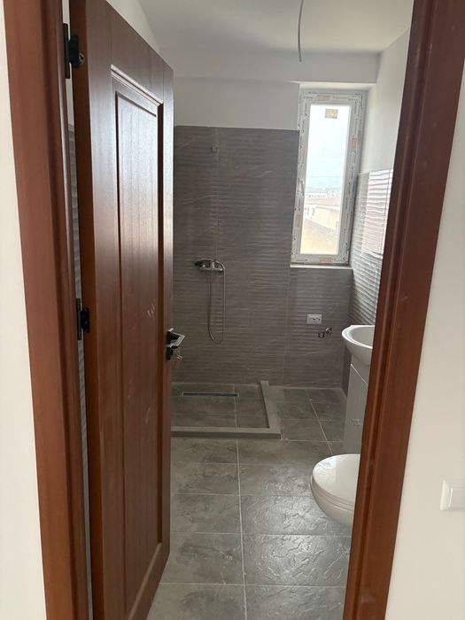 Vand garsoniera cu loc de parcare