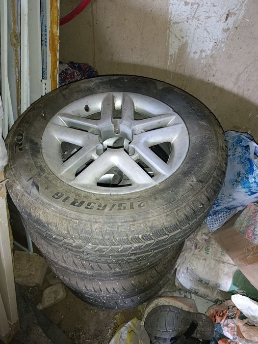 Диск с колесом 16дм на ниву